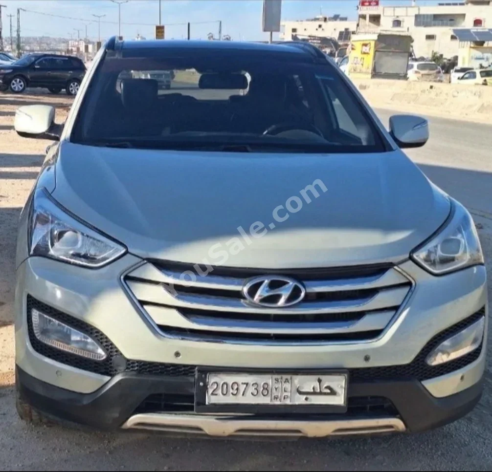 Hyundai  Santa Fe  2014  Automatic  187,000 km  4 Cylinder  FWD  SUV  Beige  Diesel