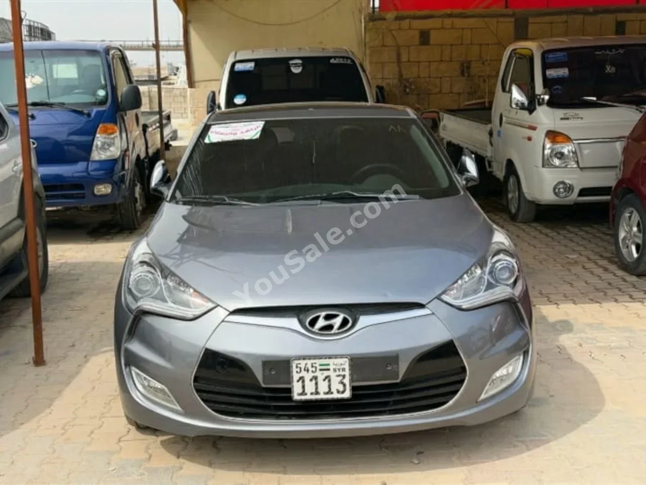 Hyundai  Veloster  2012  Automatic  149,000 km  4 Cylinder  FWD  Coupe / Sport  Silver  Gasoline