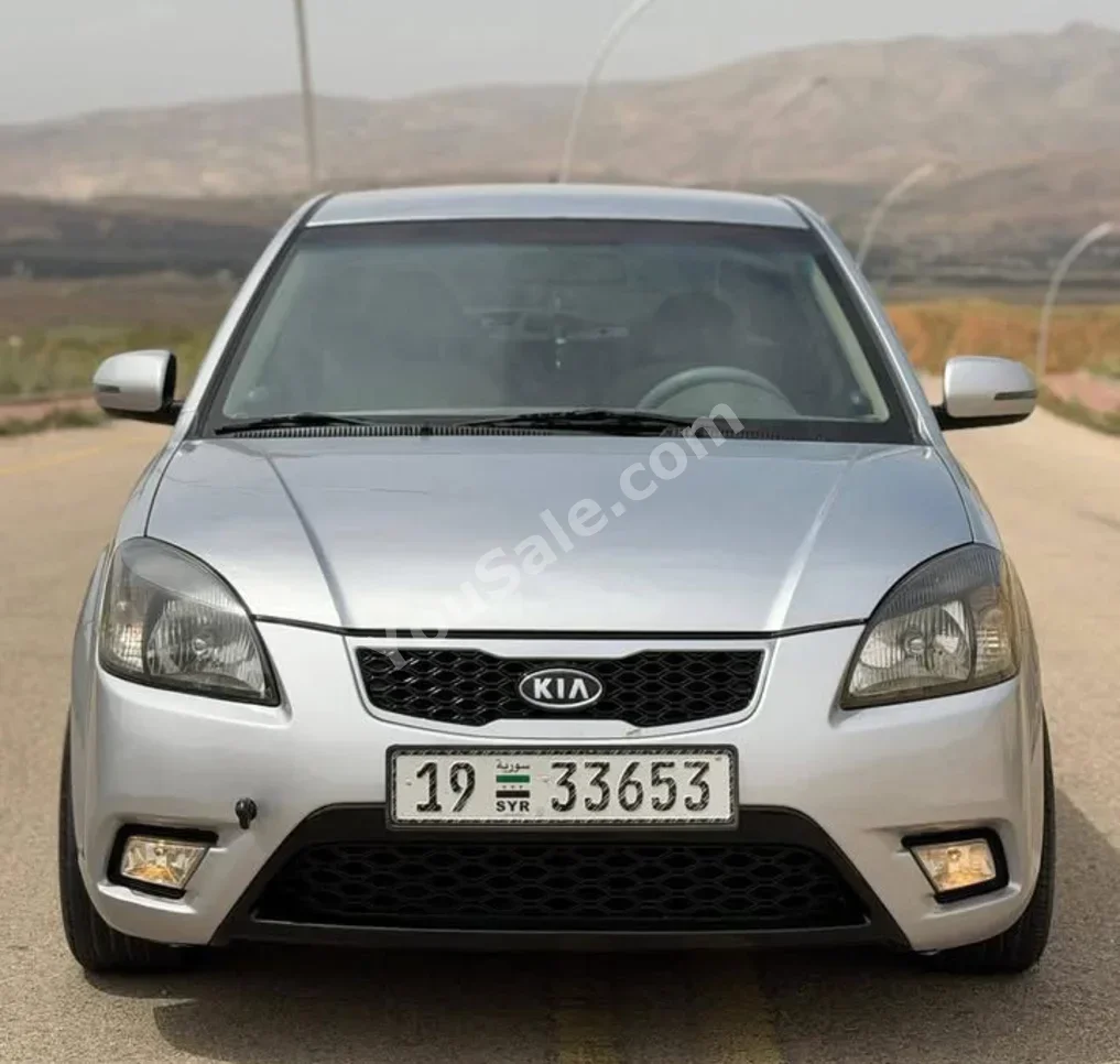 Kia  Rio  2011  Automatic  189,000 km  4 Cylinder  FWD  Sedan  Silver  Gasoline