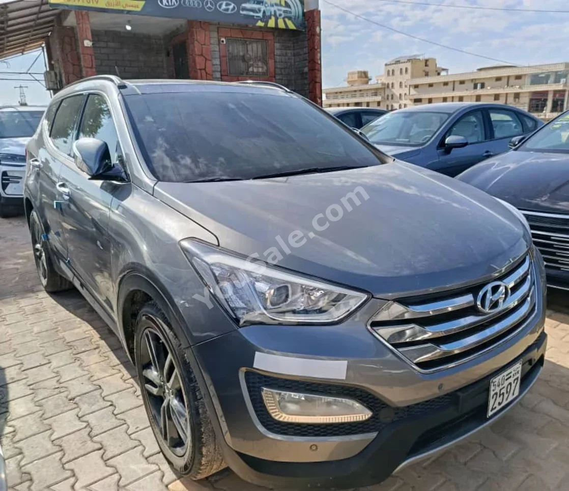 Hyundai  Santa Fe  2014  Automatic  156,000 km  4 Cylinder  FWD  SUV  Gray  Diesel