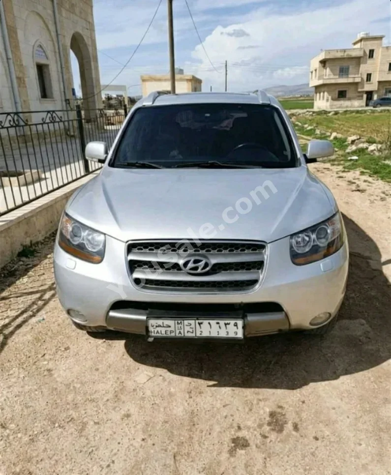 Hyundai  Santa Fe  2009  Automatic  274,000 km  4 Cylinder  FWD  SUV  Silver  Diesel