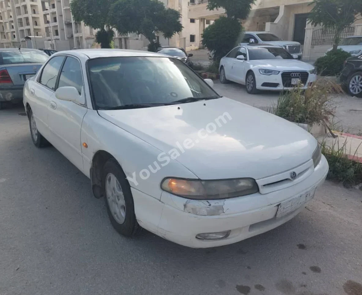 Mazda 626 1995 Automatic 376,000 km 4 Cylinder FWD Sedan White Gasoline
