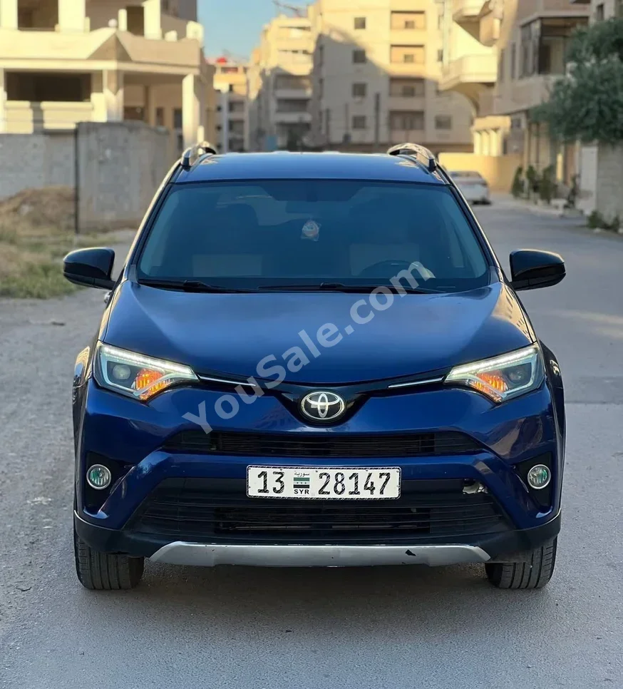 Toyota Rav 4 2014 Automatic 137,000 km 4 Cylinder AWD SUV Blue Gasoline