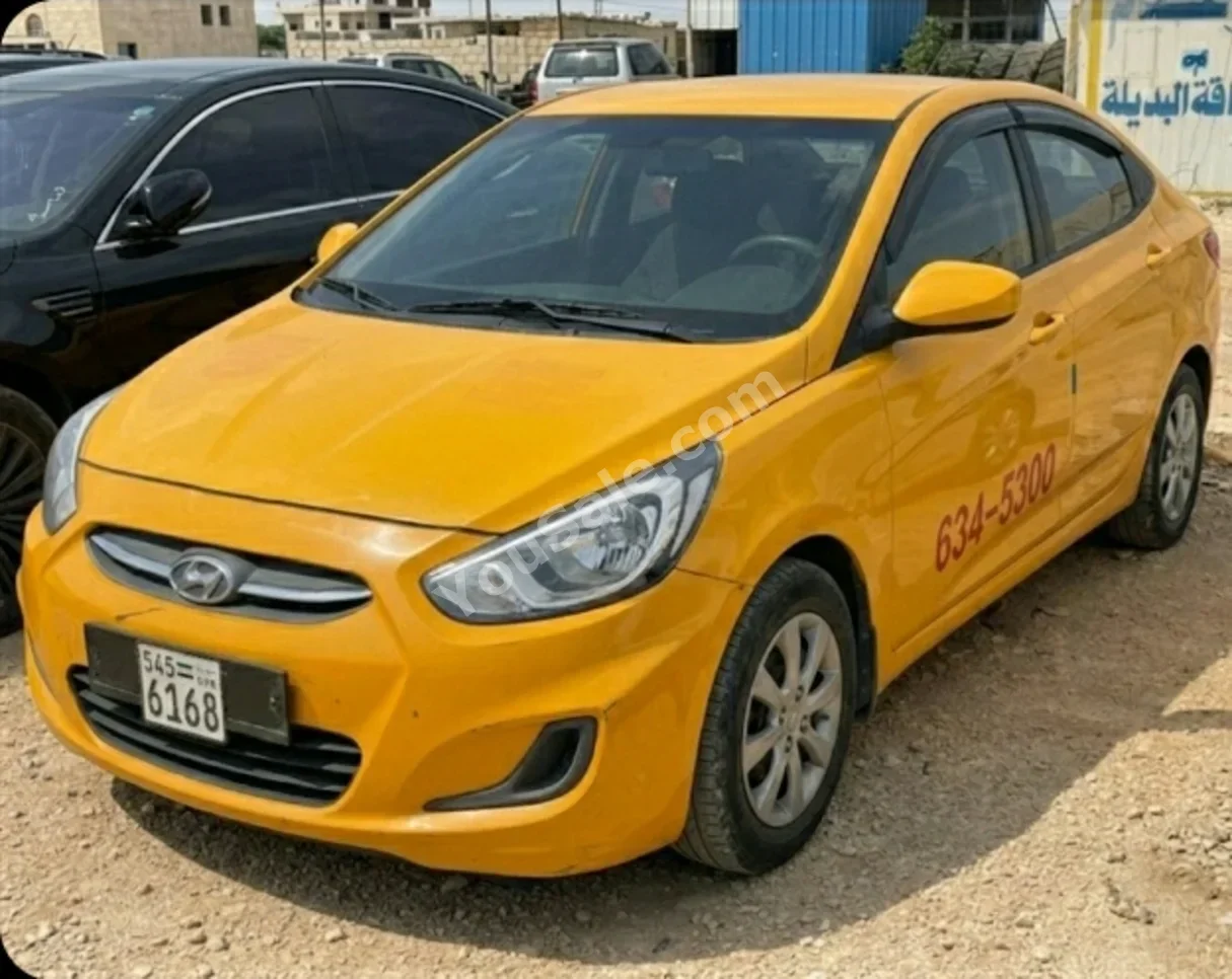 Hyundai  Accent  2017  Automatic  135,000 km  4 Cylinder  FWD  Sedan  Yellow  Gasoline