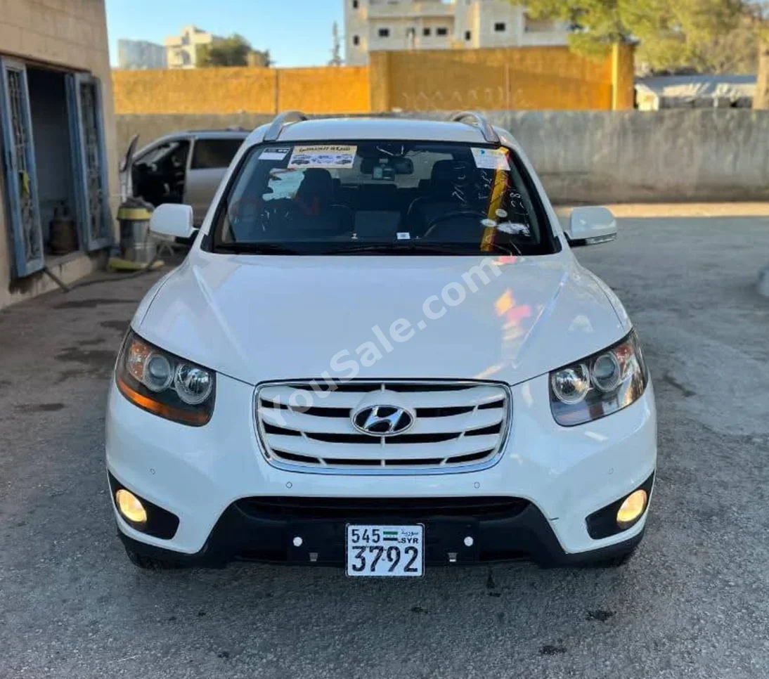 Hyundai  Santa Fe  2011  Automatic  158,000 km  4 Cylinder  FWD  SUV  White  Diesel