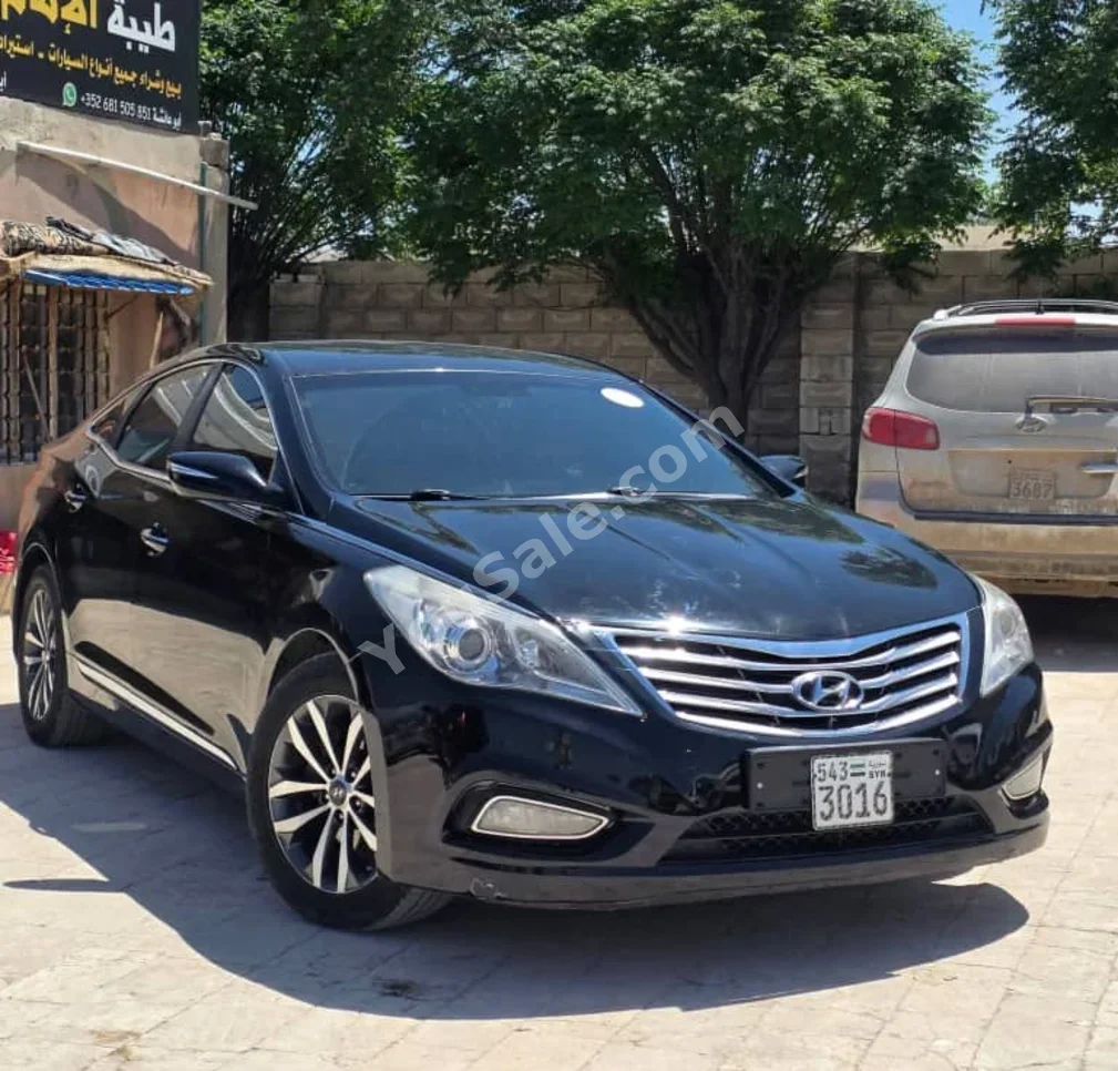 Hyundai Grandeur 2012 Automatic 185,000 km 4 Cylinder FWD Sedan Black Gasoline