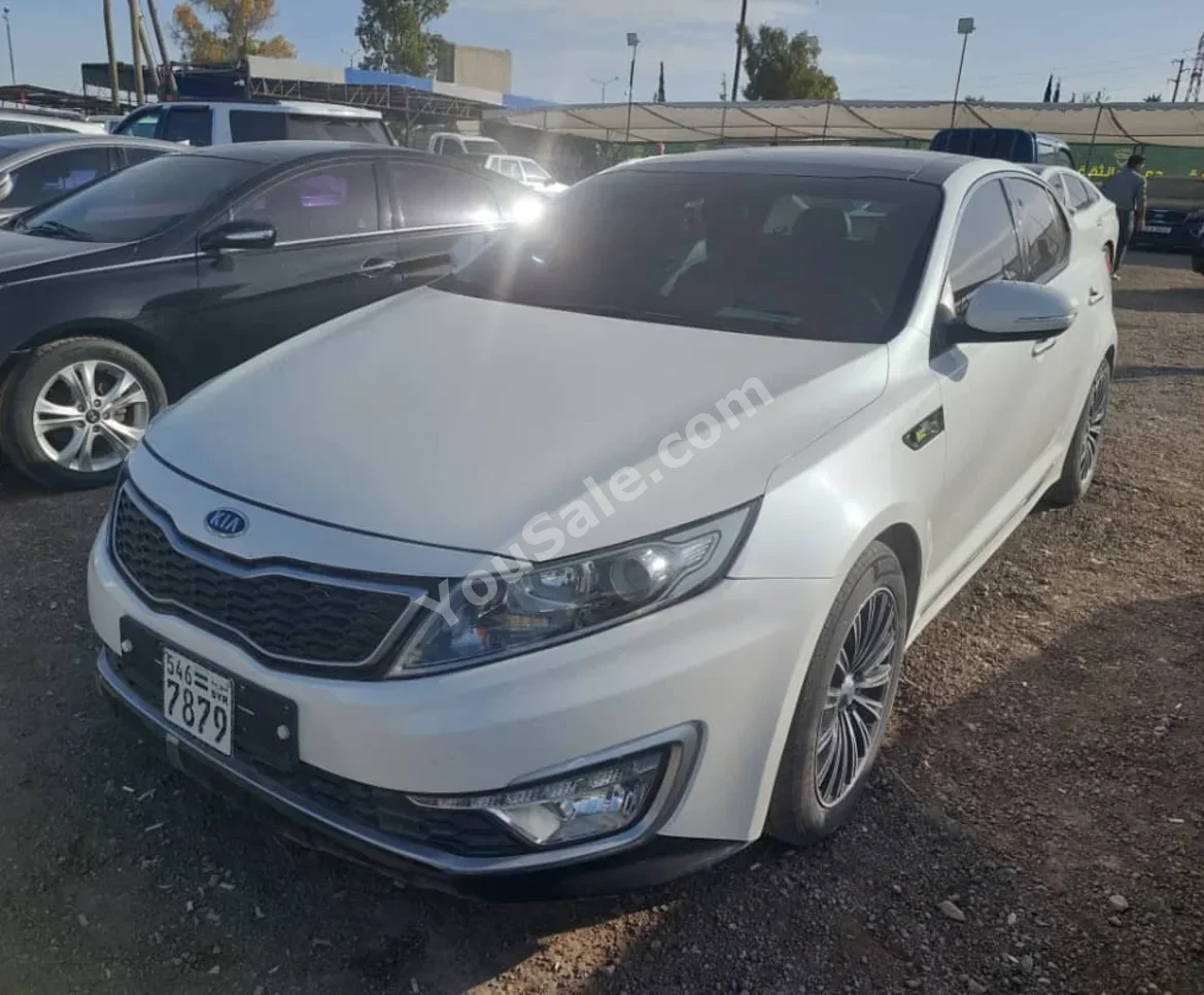 Kia  K5  2012  Automatic  200,000 km  4 Cylinder  FWD  Sedan  White  Hybrid
