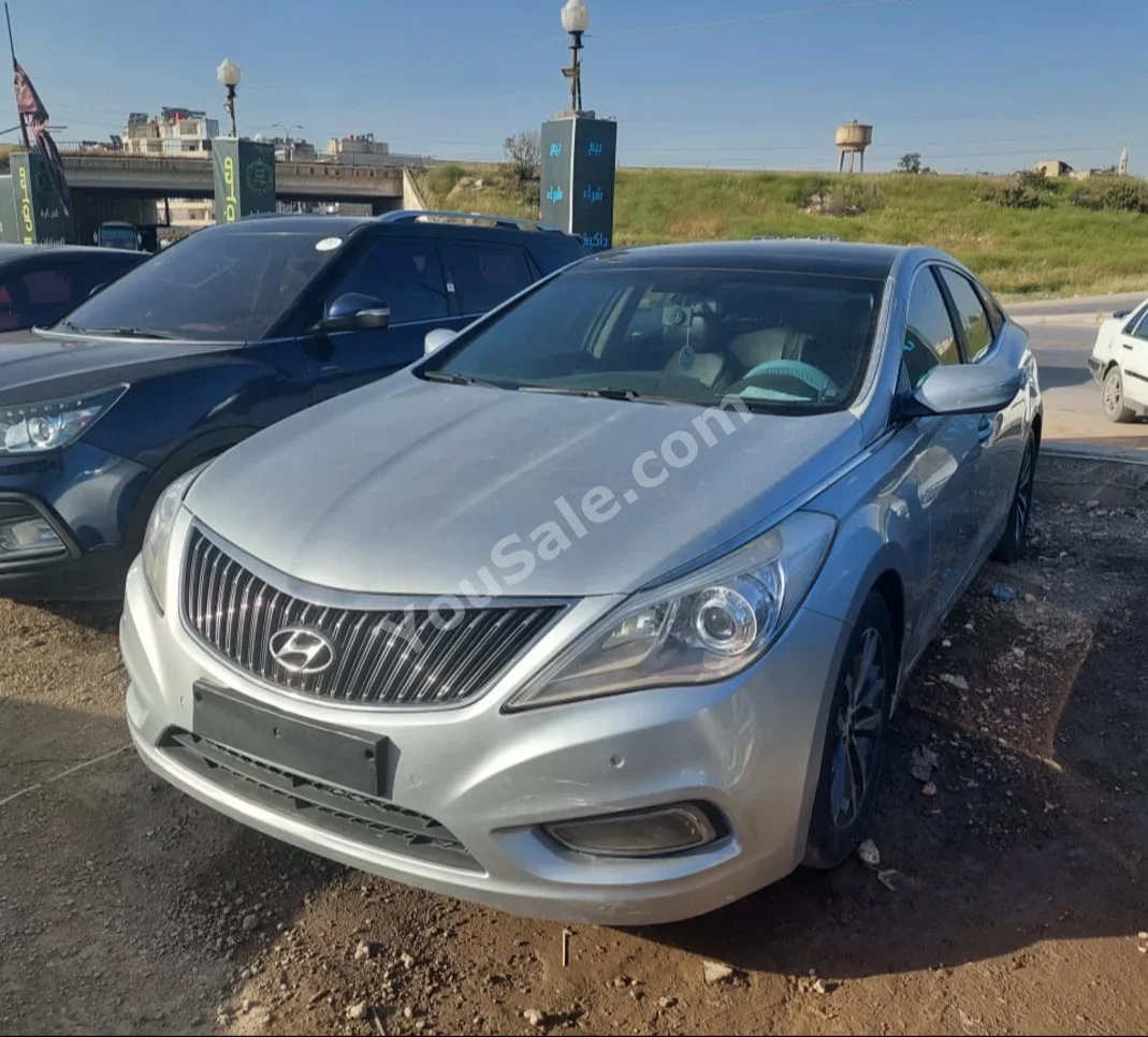 Hyundai Grandeur 2012 Automatic 266,000 km 4 Cylinder FWD Sedan Silver Gasoline