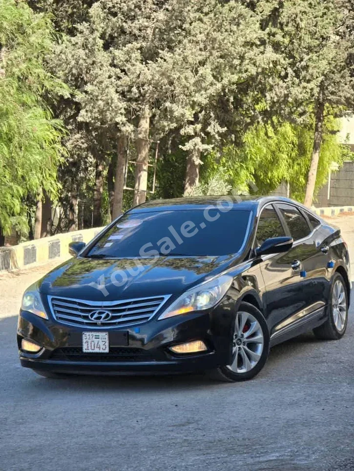 Hyundai Grandeur 2012 Automatic 124,000 km 4 Cylinder FWD Sedan Black Gasoline