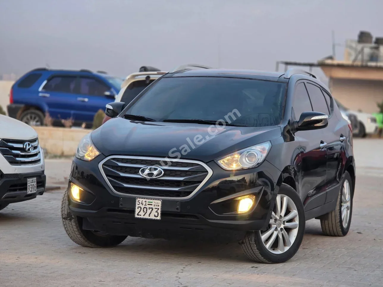 Hyundai Tucson 2012 Automatic 152,000 km 4 Cylinder FWD SUV Black Gasoline