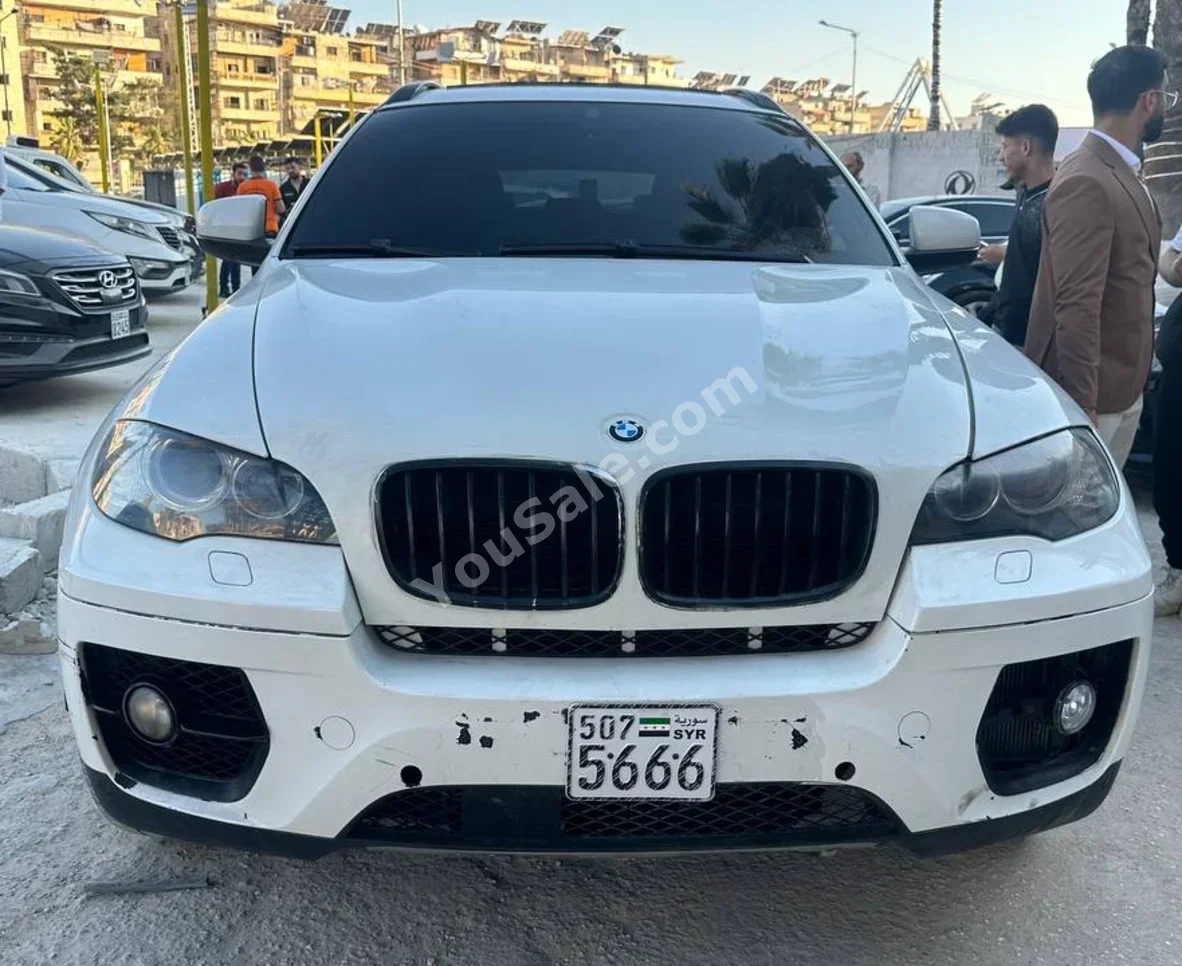 بي ام دبليو الفئة - اكس 6 2013 اتوماتيك 100,000 كم 8 سلندر دفع رباعي اس يو في أبيض بنزين