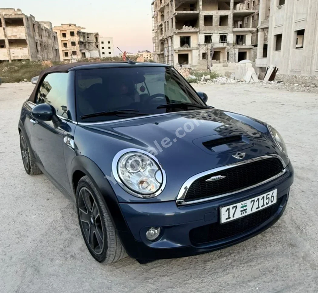 ميني كوبر اس 2009 اتوماتيك 140,000 كم 4 سلندر دفع أمامي كوبيه \ سبورت أزرق غامق بنزين