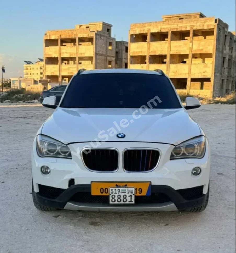 بي ام دبليو الفئة - اكس 1 2015 اتوماتيك 240,000 كم 4 سلندر دفع رباعي اس يو في أبيض بنزين