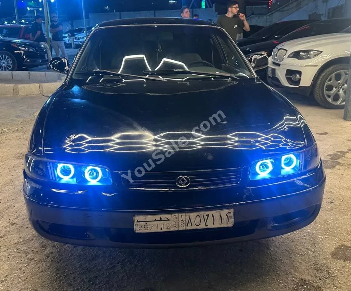 Mazda 626 1996 Manual 176,000 km 4 Cylinder FWD Sedan Black Gasoline