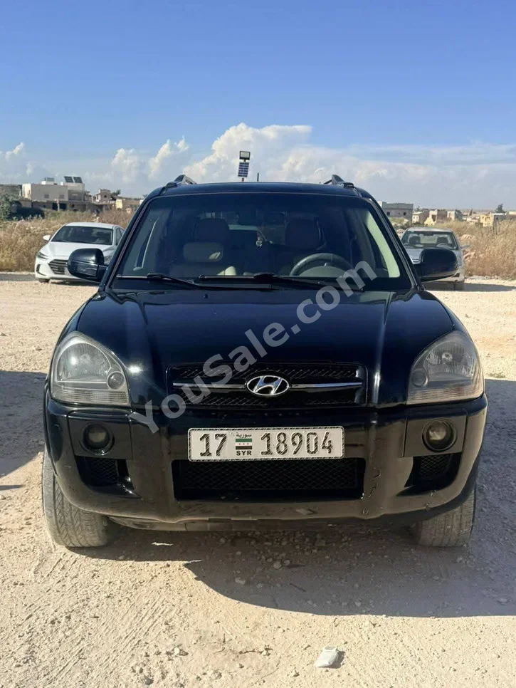Hyundai  Tucson  2007  Automatic  207,000 km  4 Cylinder  FWD  SUV  Black  Gasoline