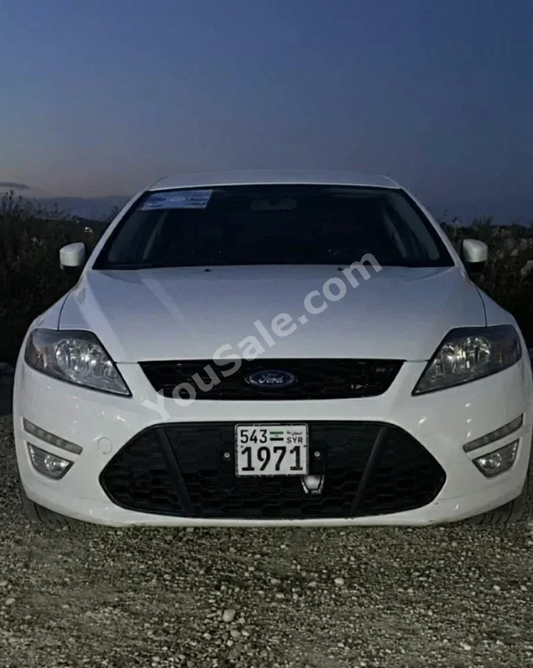 Ford  Mondeo  2014  Automatic  155,000 km  4 Cylinder  FWD  Sedan  White  Diesel