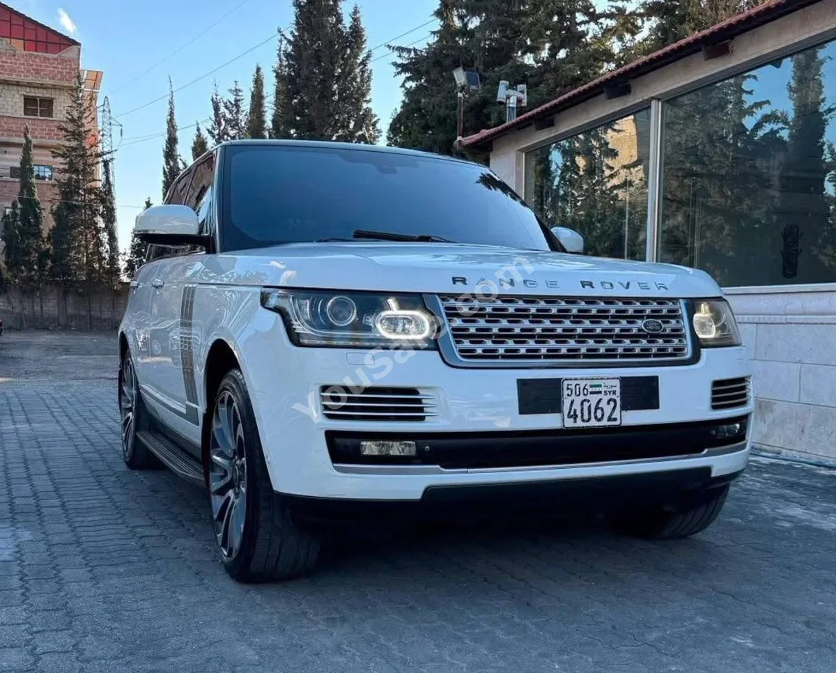 Land Rover  Range Rover  Vogue  2015  Automatic  125,000 km  8 Cylinder  AWD  SUV  White  Gasoline