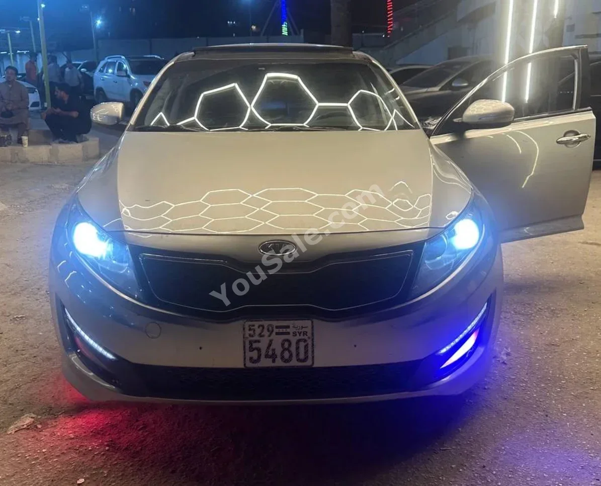 Kia  K5  2012  Automatic  300,000 km  4 Cylinder  FWD  Sedan  Silver  Gasoline