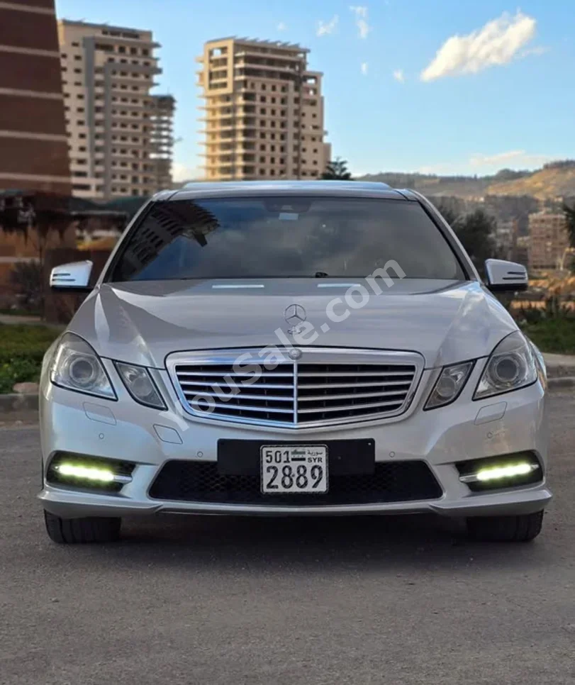 Mercedes-Benz  E-Class  300  2012  Automatic  175,000 km  6 Cylinder  RWD  Sedan  Silver  Gasoline