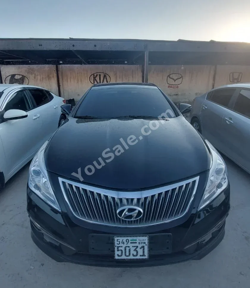هيونداي غراندير 2014 اتوماتيك 109,000 كم 4 سلندر دفع أمامي سيدان أسود بنزين