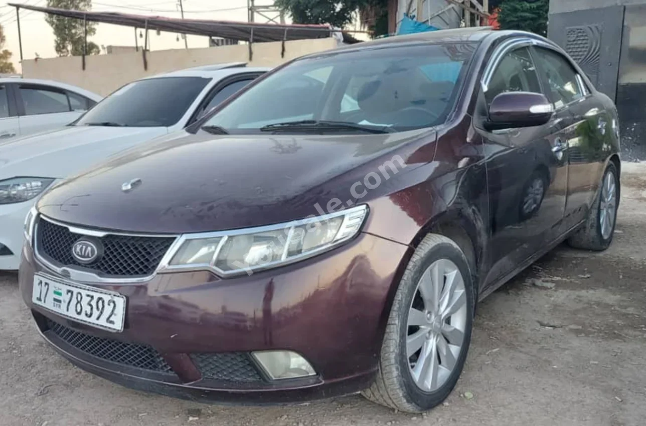 Kia  Cerato  2011  Automatic  176,000 km  4 Cylinder  FWD  Sedan  Purple  Gasoline