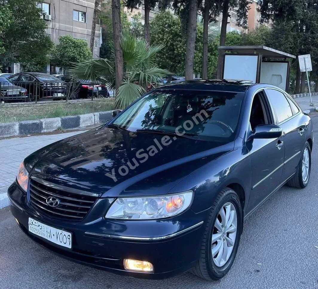 هيونداي ازيرا 2006 اتوماتيك 200,000 كم 4 سلندر دفع أمامي سيدان أسود بنزين