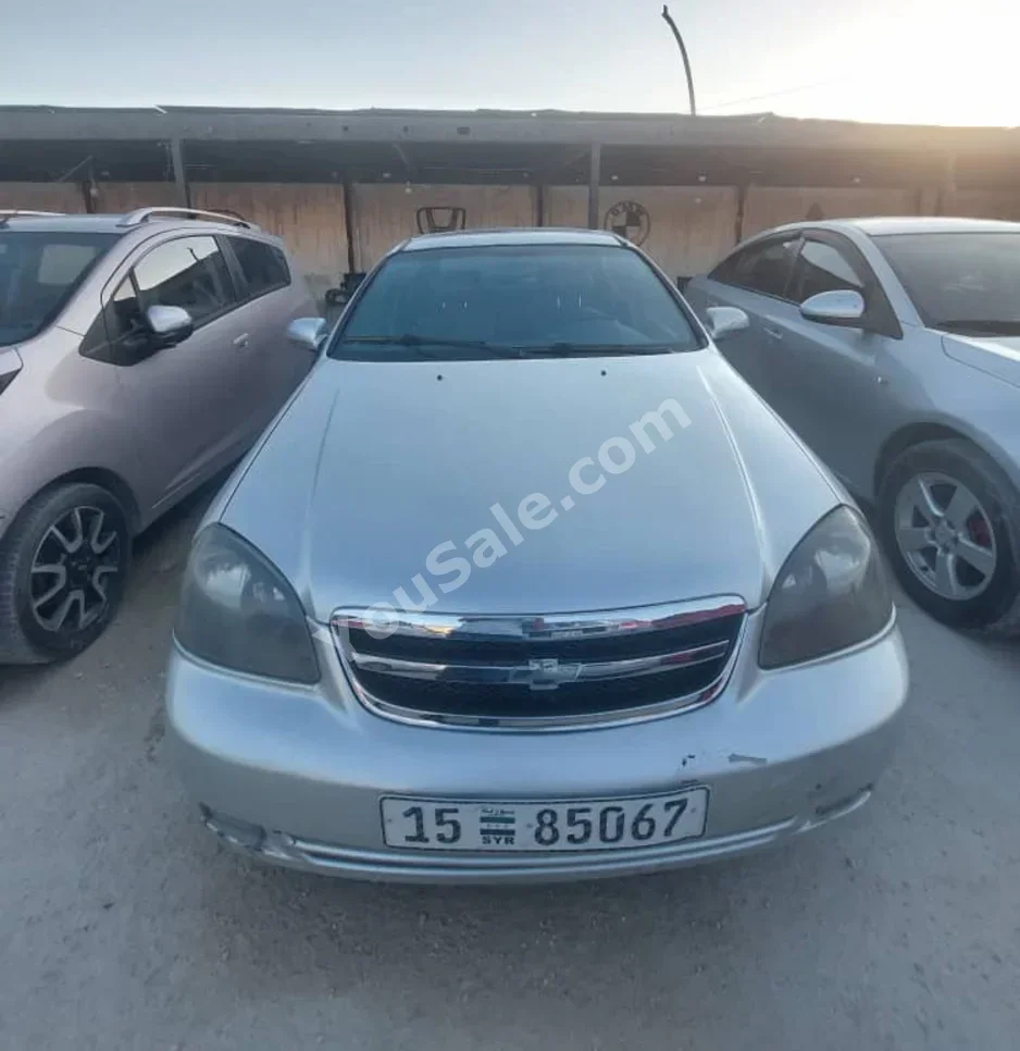 شفروليه اوبترا 2010 اتوماتيك 194,000 كم 4 سلندر دفع أمامي سيدان فضي بنزين