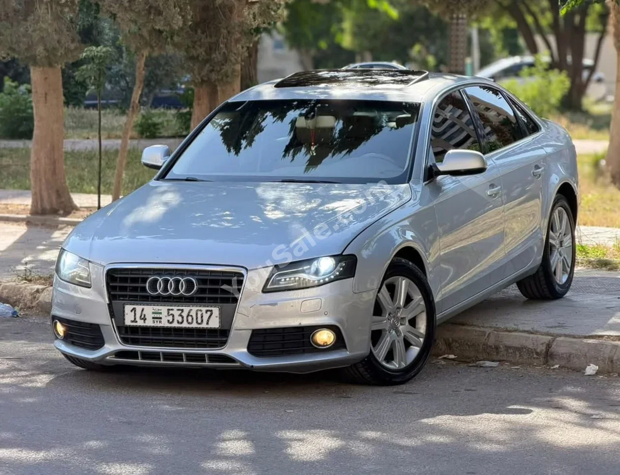 Audi  A4  2011  Automatic  135,000 km  4 Cylinder  RWD  Sedan  Silver  Gasoline