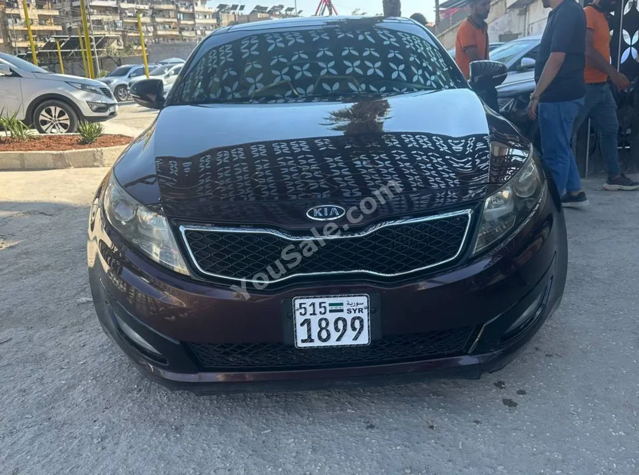 Kia Optima 2013 Automatic 231,000 km 4 Cylinder FWD Sedan Brown Gasoline