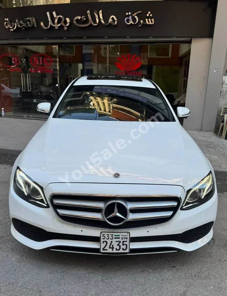 Mercedes-Benz  E-Class  300  2019  Automatic  117,000 km  4 Cylinder  4WD  Sedan  White  Gasoline