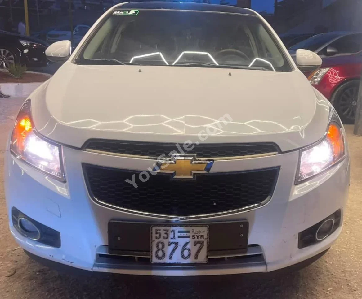 Chevrolet  Cruze  2012  Automatic  240,000 km  4 Cylinder  FWD  Sedan  White  Gasoline