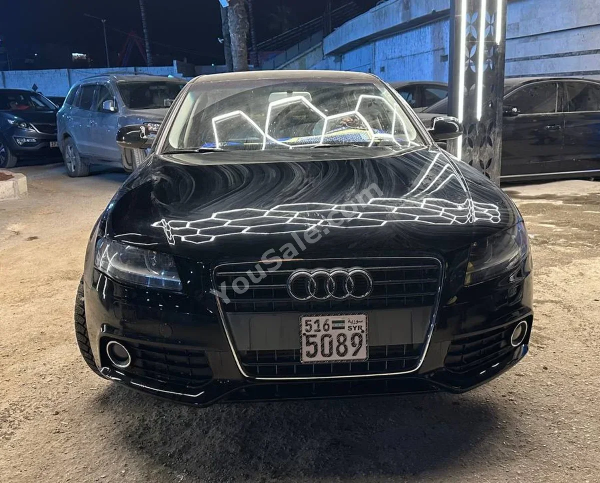 Audi  A4  2.0 T  2012  Automatic  241,000 km  4 Cylinder  RWD  Sedan  Black  Gasoline