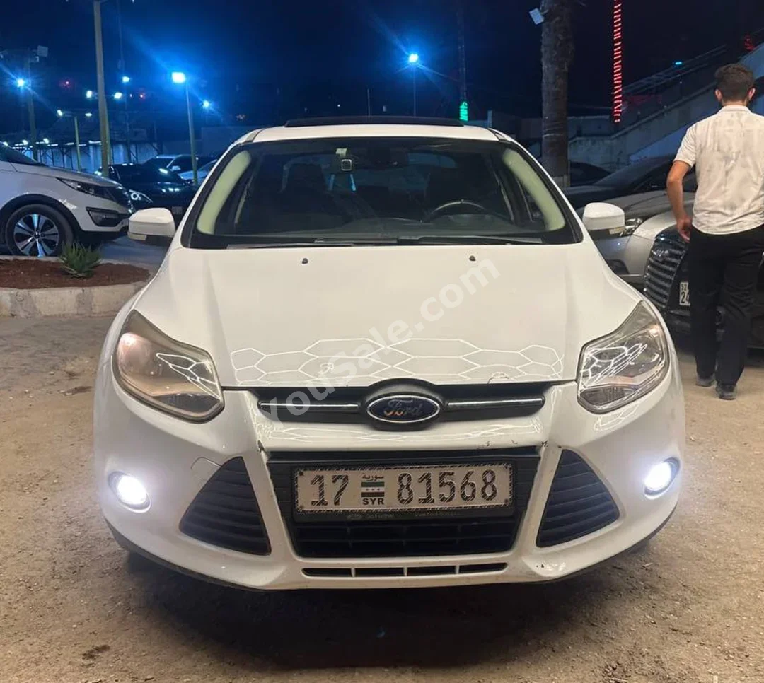 Ford Focus 2013 Automatic 230,000 km 4 Cylinder FWD Sedan White Diesel