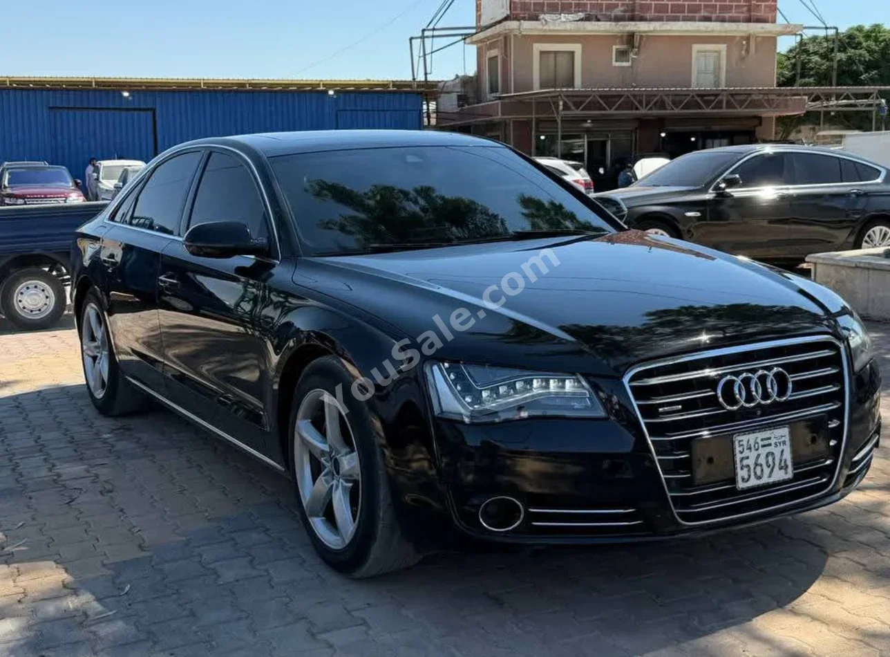 اودي  أي 8  2013  اتوماتيك  145,000 كم  6 سلندر  دفع رباعي  سيدان  أسود  ديزل