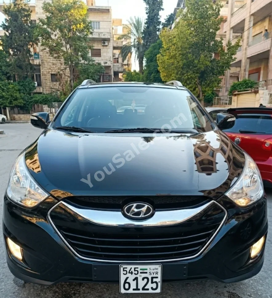 Hyundai Tucson 2010 Automatic 216,000 km 4 Cylinder FWD SUV Black Diesel