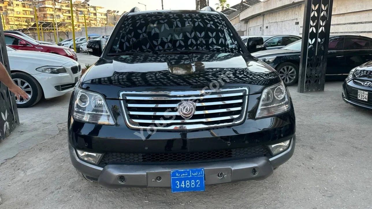 كيا موهافي 2014 اتوماتيك 186,000 كم 6 سلندر دفع خلفي اس يو في أسود ديزل