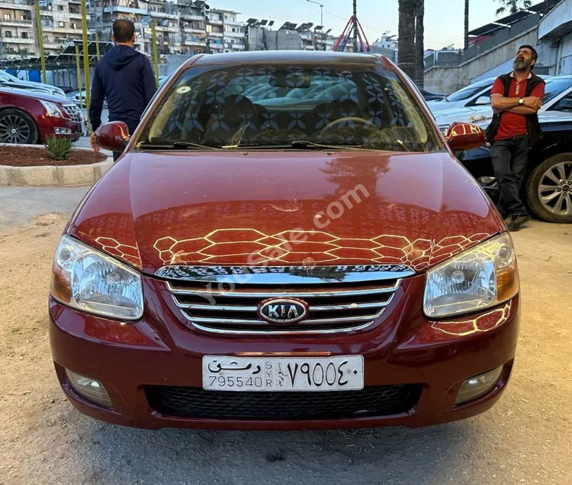 Kia  Cerato  2008  Automatic  120,000 km  4 Cylinder  FWD  Sedan  Red  Gasoline
