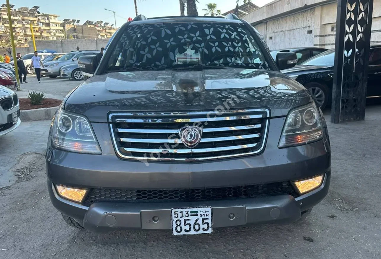كيا موهافي 2008 اتوماتيك 340,000 كم 6 سلندر دفع خلفي اس يو في رصاصي ديزل