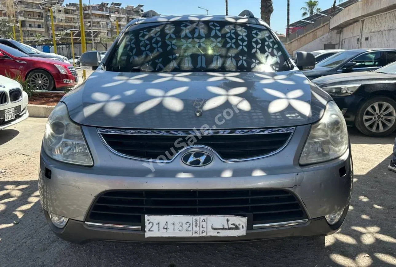 Hyundai  Veracruz  2010  Automatic  171,000 km  6 Cylinder  FWD  SUV  Silver  Diesel