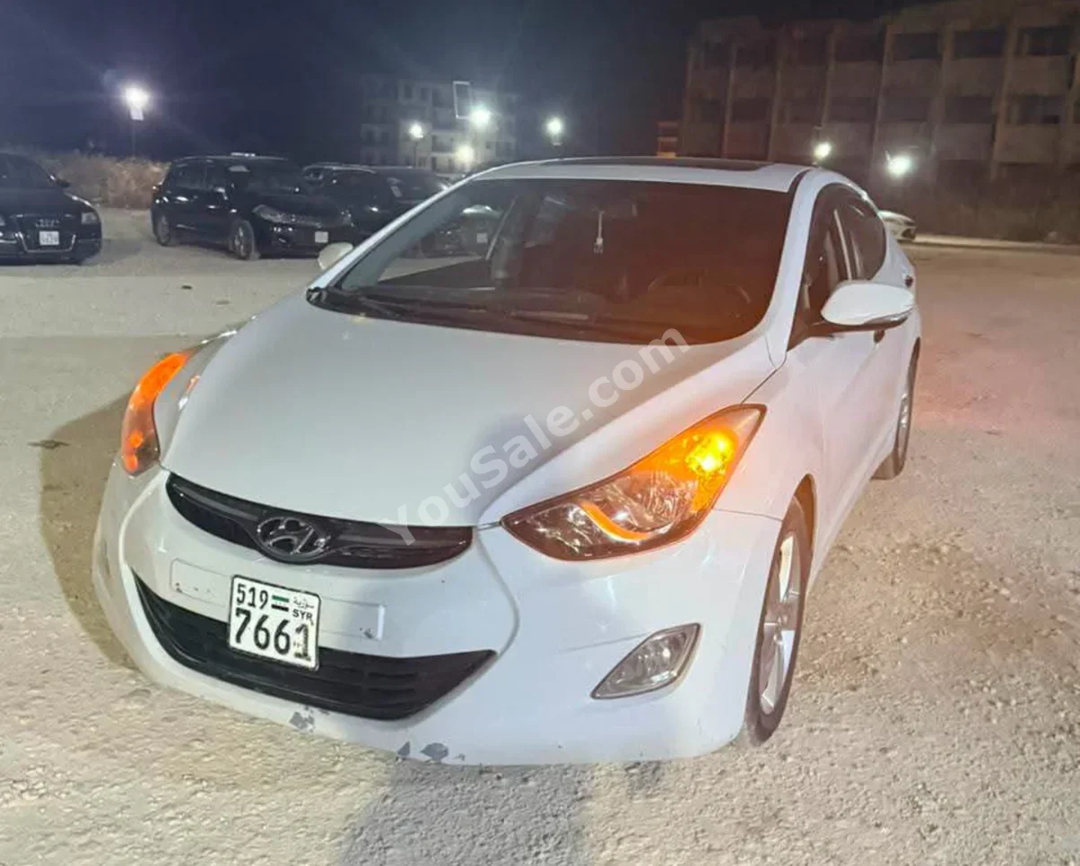 Hyundai  Avante  2012  Automatic  214,000 km  4 Cylinder  FWD  Sedan  White  Gasoline