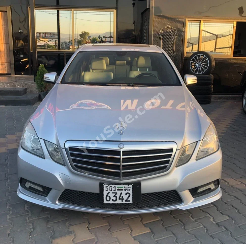 Mercedes-Benz  E-Class  300  2011  Automatic  189,000 km  6 Cylinder  RWD  Sedan  Silver  Gasoline