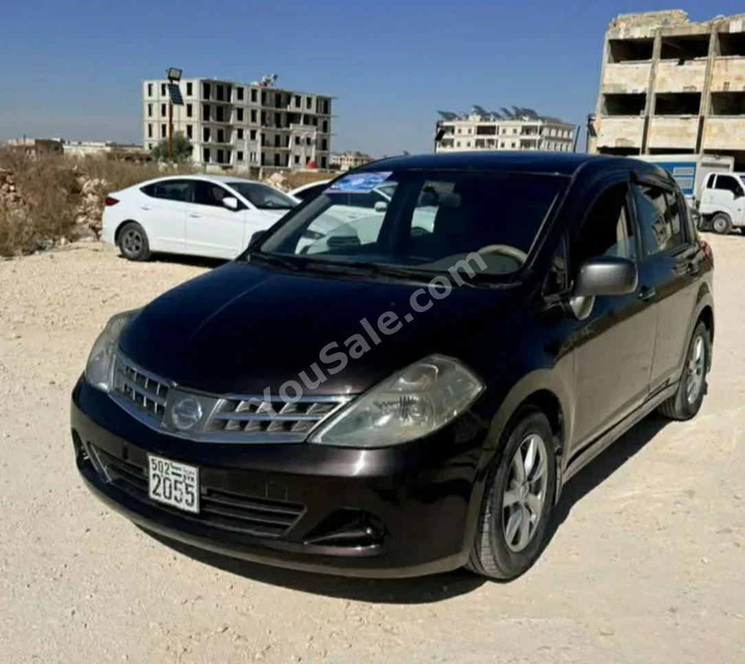 Nissan  Tiida  2012  Automatic  198,000 km  4 Cylinder  FWD  SUV  Violet  Gasoline