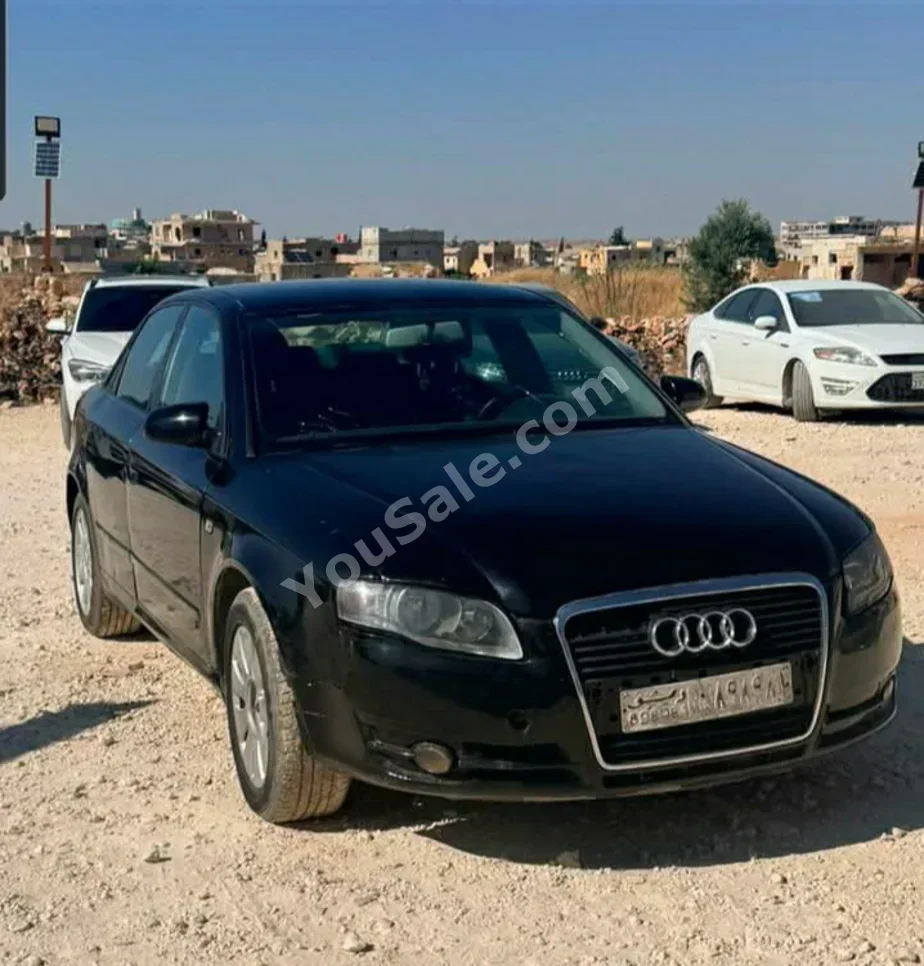 Audi  A4  2006  Automatic  268,000 km  4 Cylinder  RWD  Sedan  Black  Gasoline