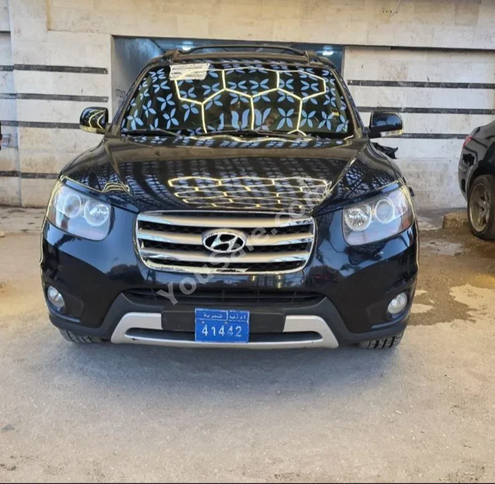 Hyundai  Santa Fe  2008  Automatic  184,000 km  4 Cylinder  FWD  SUV  Black  Diesel