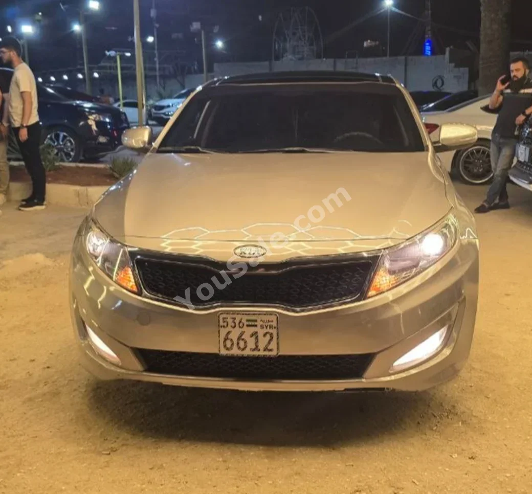 Kia  K5  2011  Automatic  140,000 km  4 Cylinder  FWD  Sedan  Silver  Gasoline