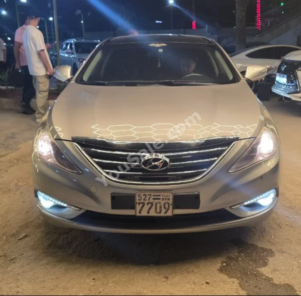 Hyundai  Sonata  2014  Automatic  220,000 km  4 Cylinder  FWD  Sedan  Silver  Gasoline