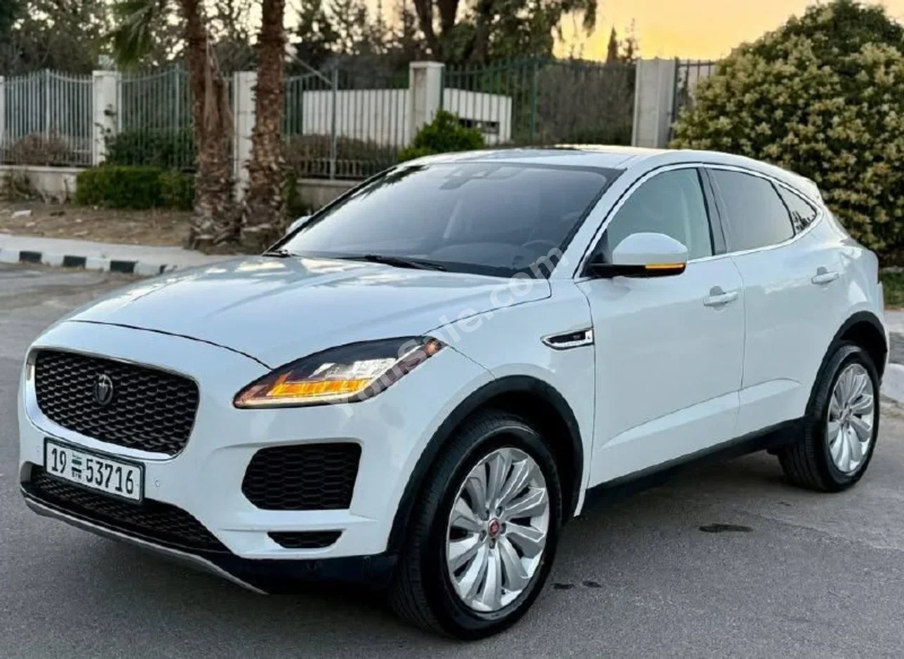 Jaguar  E-Pace  2019  Automatic  104,000 km  4 Cylinder  AWD  SUV  White  Gasoline
