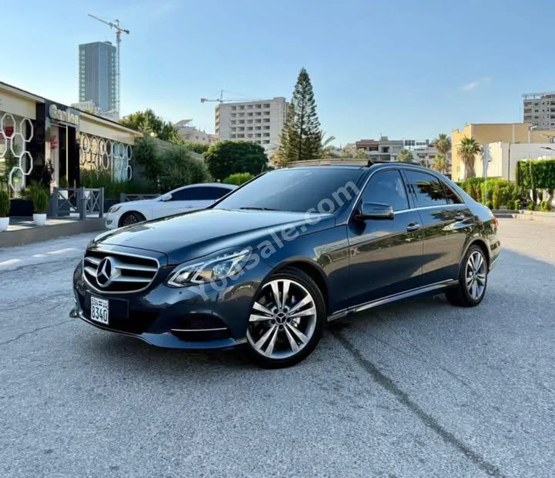 Mercedes-Benz  E-Class  300  2014  Automatic  168,000 km  6 Cylinder  4WD  Sedan  Dark Blue  Gasoline