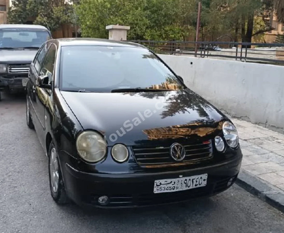 فوكس واغن بولو 2003 اتوماتيك 192,000 كم 4 سلندر دفع أمامي هاتشباك أسود بنزين