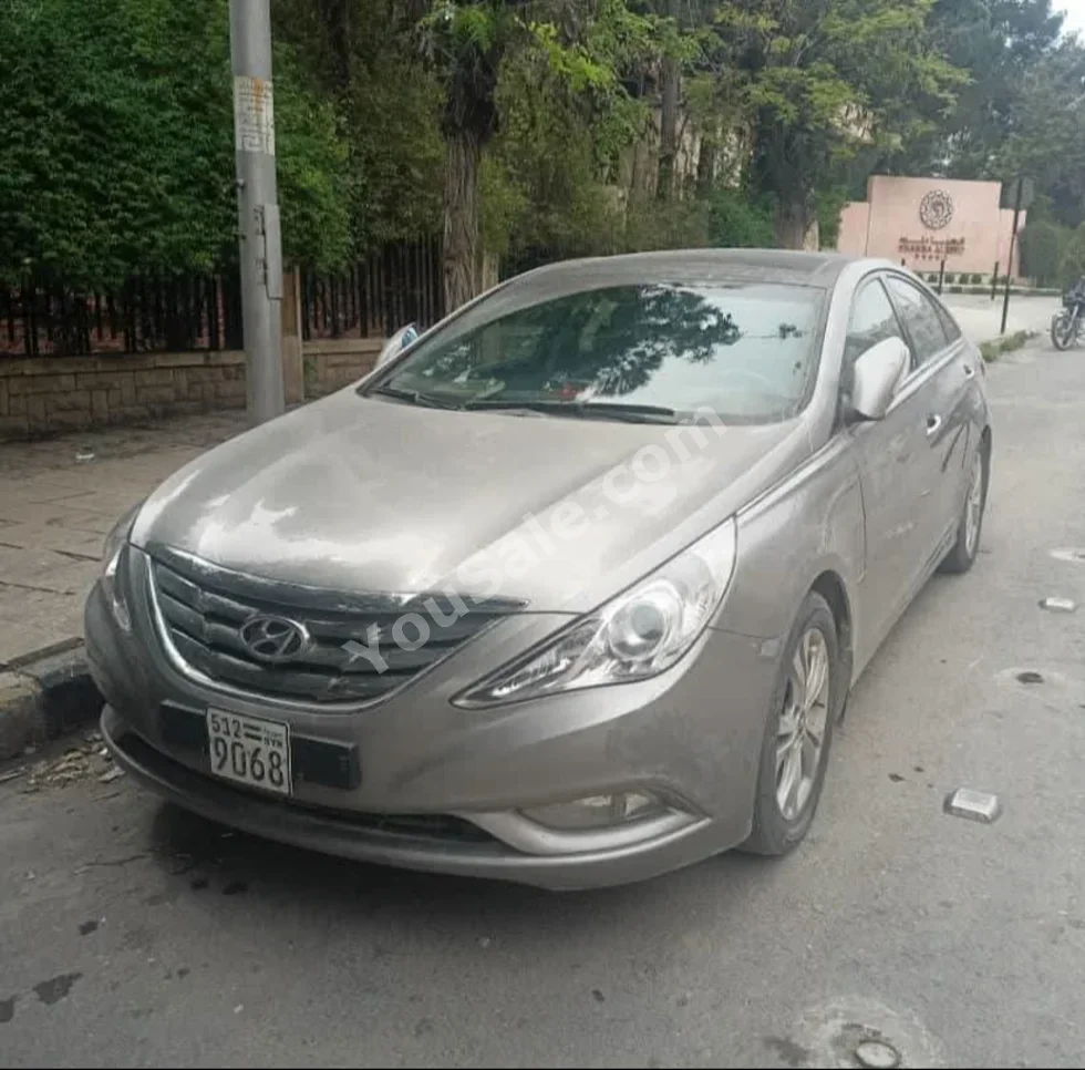 هيونداي سوناتا 2011 اتوماتيك 225,000 كم 4 سلندر دفع أمامي سيدان فضي بنزين
